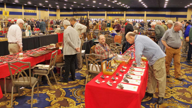  Floor action at a past edition of the Las Vegas Antique Arms Show. Morphy Auctions image