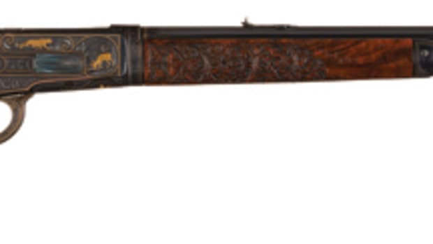  Spectacular Documented John Ulrich Signed Factory Grade No. 1 Engraved, Gold and Platinum Inlaid Winchester Model 1886 Takedown .50 Express Lever Action Rifle with Style A Carved Stock with Factory Letter from the Mac McCroskie Collection: The Finest 1886 Winchester Known