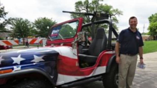  On June 2, 2018, Kansas Secretary of State and Republican gubernatorial candidate, Kris Kobach rode in the machine gun-bearing Jeep in a parade in Shawnee, Kansas. Some loved it, others thought it was a misstep. Photo via Kobach's Twitter feed