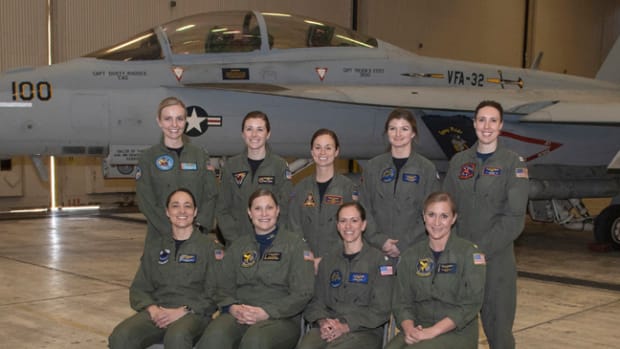  Naval aviators participating in a flyover to honor the life and legacy of retired Navy Capt. Rosemary Mariner pose for a photo in a hangar bay at Naval Air Station Oceana in Virginia Beach, Virginia, Jan. 31, 2019. The U.S. Navy is scheduled to conduct the first ever all-female flyover Feb. 2 in Maynardville, Tennessee as part of the funeral service for Mariner, a female Naval aviation pioneer. Back row, from left to right: Lt. Christy Talisse, Lt. Emily Rixey, Lt. Cmdr. Jennifer Hesling, Lt. Kelly Harris, Lt. Amanda Lee. Front row from left to right: Lt. Cmdr. Danielle Thiriot, Cmdr. Stacy Uttecht, Cmdr. Leslie Mintz, and Lt. Cmdr. Paige Blok. (U.S. Navy photo by Mass Communication Specialist 3rd Class Raymond Maddocks/Released)