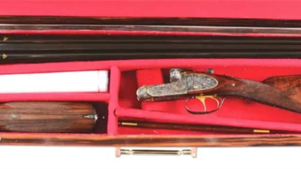  Russian M11 Model, 12-bore shotgun presented to Nikita Khrushchev in 1959, Purdey-type action, inscribed to mark the commencement in 1959 of the 21st session of the Communist Party in the Soviet Union.