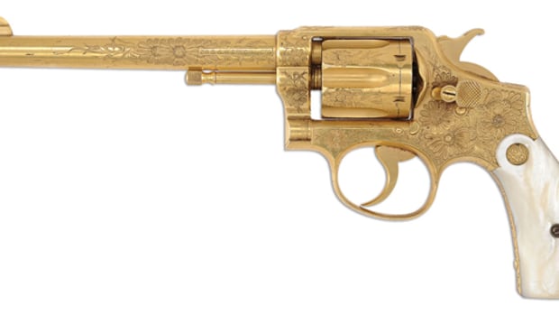 Lot 1748 A factory engraved and gold plated Smith & Wesson 38 Hand Ejector 1st Model DA Revolver for the Pan-American Expo, Buffalo, NY 1901.