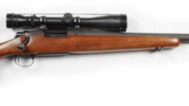 Remington Model 40 sniper rifle of the type used by the US Marine Corps in Vietnam, in original, unmodified condition, $26,400. Morphy Auctions image