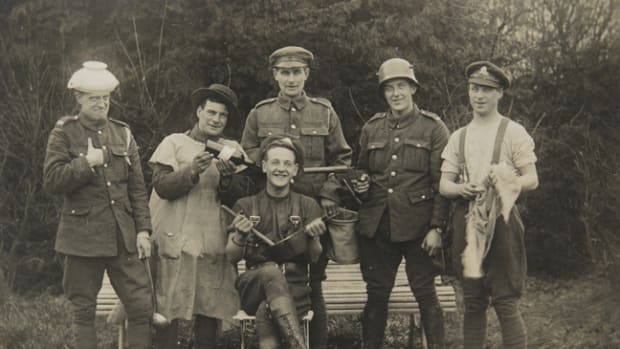 A group of British soldiers clown for the camera, ca. 1916. The soldier wearing a captured German helmet is also holding an Austrian Hebel Pattern flare pistol. Flare guns were valuable to both sides during WWI, being used by aviators, ground troops, and naval forces to illuminate, communicate, and signal — roles that signal guns fulfill to this day.