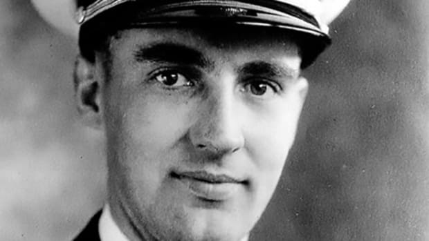  Lt. j.g. Aloysius H. Schmitt who was killed during the Japanese attack on Pearl Harbor Dec. 7, 1941. (Photo Courtesy of Loras College/Released)