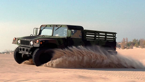 Humvee driving in the sand