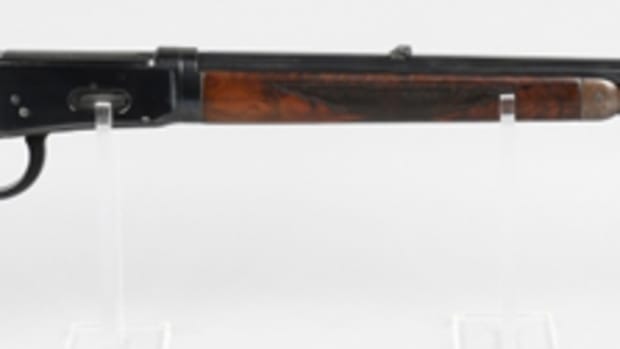  Deluxe Special Order Winchester Model 1894 rifle, .30-.35 caliber, 26-inch half-octagon barrel, serial number applied in 1907.