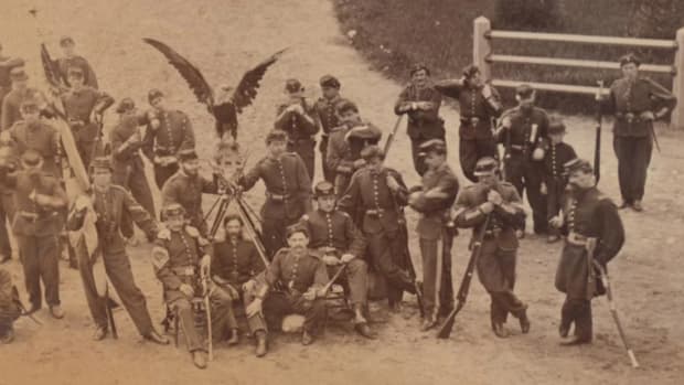  1861 Civil War mammoth-plate albumen print depicting the 8th Wisconsin Volunteer Infantry Regiment with their eagle mascot ‘Old Abe,’ 13½ x 19in (sight). Image courtesy of Milestone Auctions
