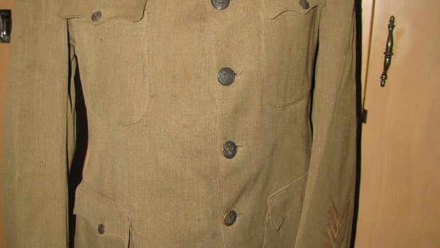 A well-made captain’s tunic worn by a member of the Russian Railway Service Corps, technicians on the Trans-Siberian rail road.