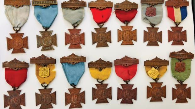 This Women’s Relief Corps collection exhibits a rainbow of ribbon colors and unique brooches.