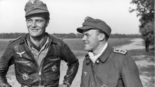 (left) Lt. Hans-Ulrich Jung of III./JG 3 wearing a Deutsches Kreuz in Gold. During WWII, Germany awarded the German Cross in two grades: Gold and Silver.