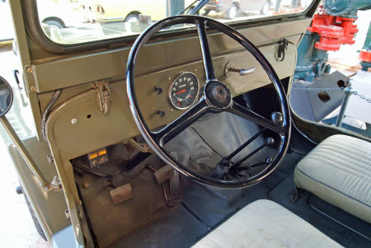 Two unusual features of the Turkish Willys are the leather-style boots on the shift levers and custom-fitted rubber mats covering the floor and side walls.