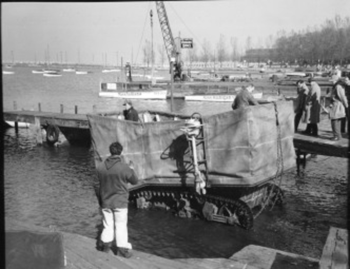 To counter the Alligator's lack of armor and firepower, Studebaker was contracted to adapt a Stuart light tank for amphibious operations. This was achieved through the use of folding canvas floatation screens and outboard motors.