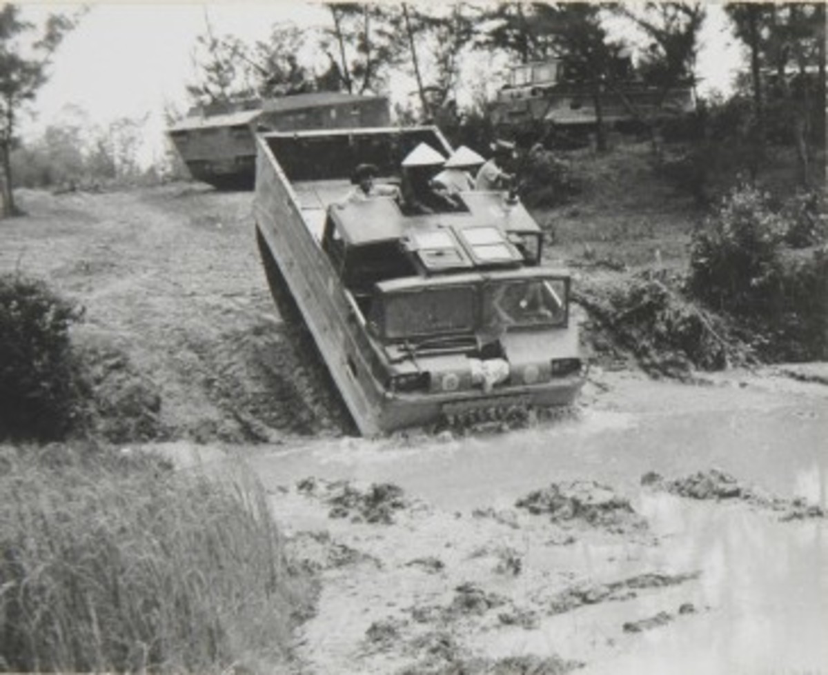 Also employed by the Marines in Vietnam was the Blaw-Knox built M116 Husky, seen in the foreground, and the Pacific Car and Foundry built armored Husky, following. Both seen here in Vietnam in service of the 11th Motor Transport Battalion in March 1970.