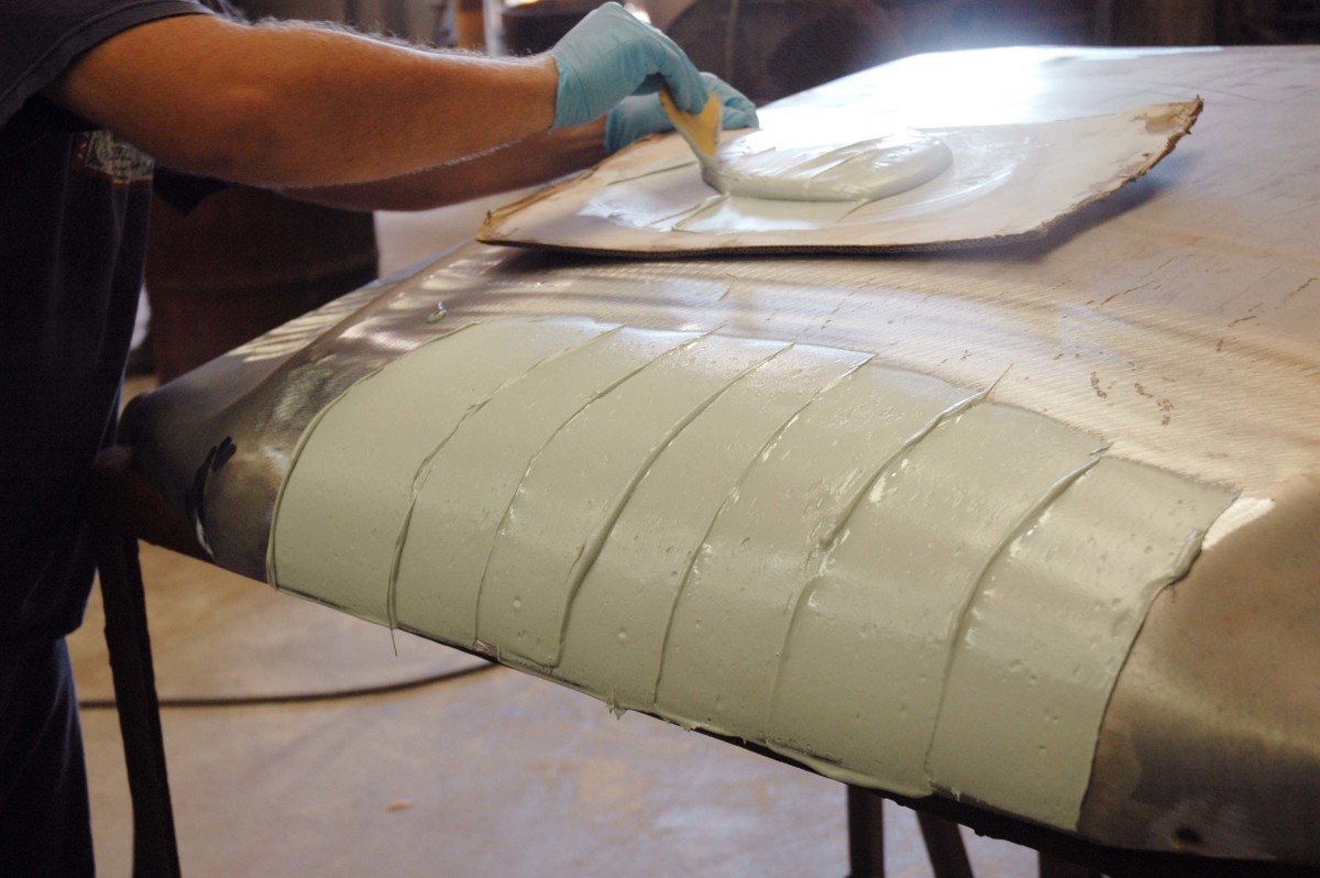 If a panel has many imperfections, it is often stripped to bare steel. Then, a "skim coat" of body filler is applied. The objective is to fill and smooth any indentations in the panel surface. Be aware, however, that evidence of spot welded joints were evident on most wheeled military vehicles when they were new, unlike their civilian counterparts that had these "flaws" filled at the factory.
