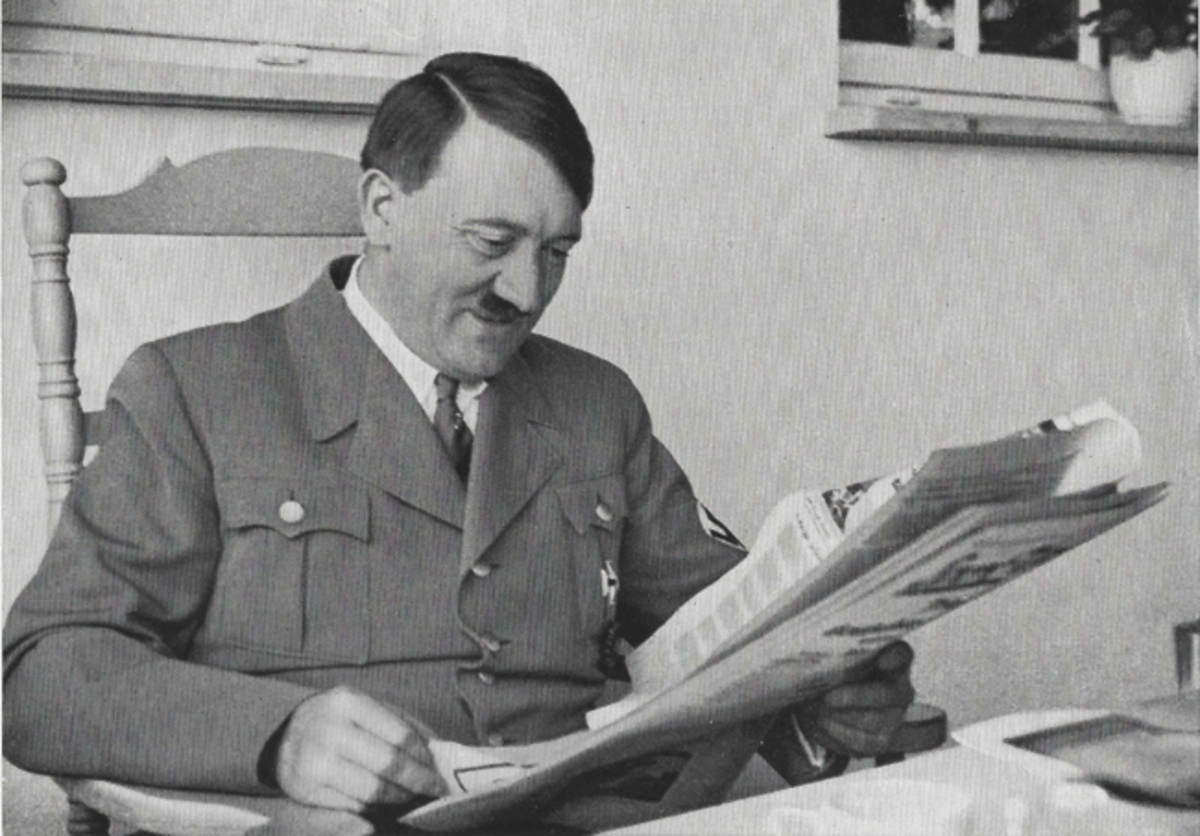 After the rise of the Nazi power, the the Völkischer Beobachter became the Party’s official newspaper. Here, Adolf Hitler smiles as he reads the news in the Beobachter — his favorite newspaper.