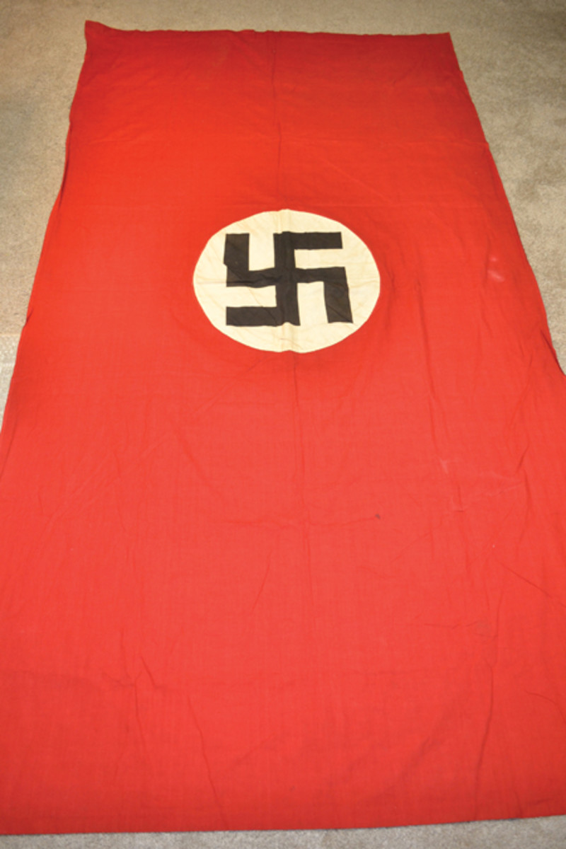  The banner that bit me with the collecting bug: Robort Goron liberated this large Nazi banner from a German village after crossing the Rhine. He gave it to me when I was a teenager. It would be nearly 40 years later that I acquired his souvenirs and typed account of his WWII service.