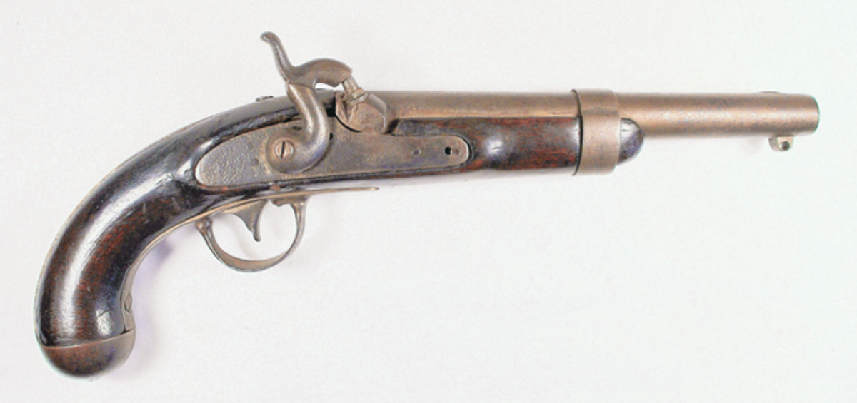  When I was ten years old, I purchased a very rough Model 1836 Pistol. It had been found lying on the ground. One side of the stock was rotted. The pistol had been converted from flintlock to percussion.