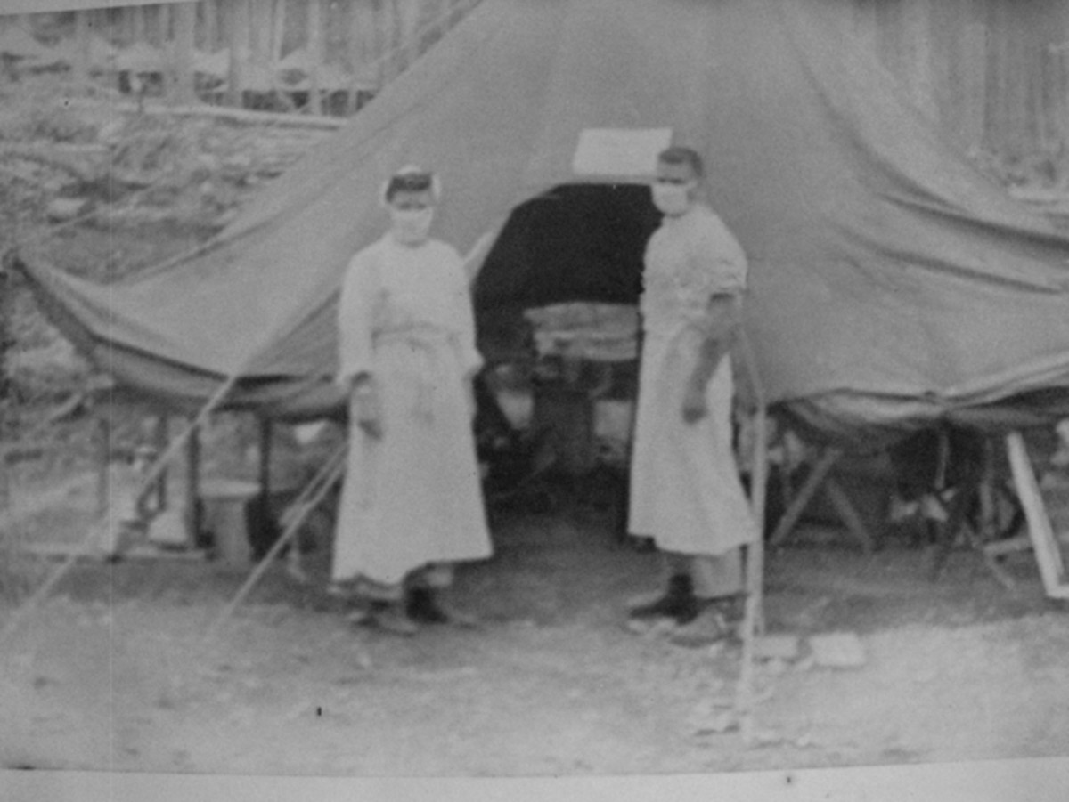  Mangold and an unnamed doctor taking a break. During her service, Mangold treated hundreds of wounded and sick US soldiers, Marines, and sailors.