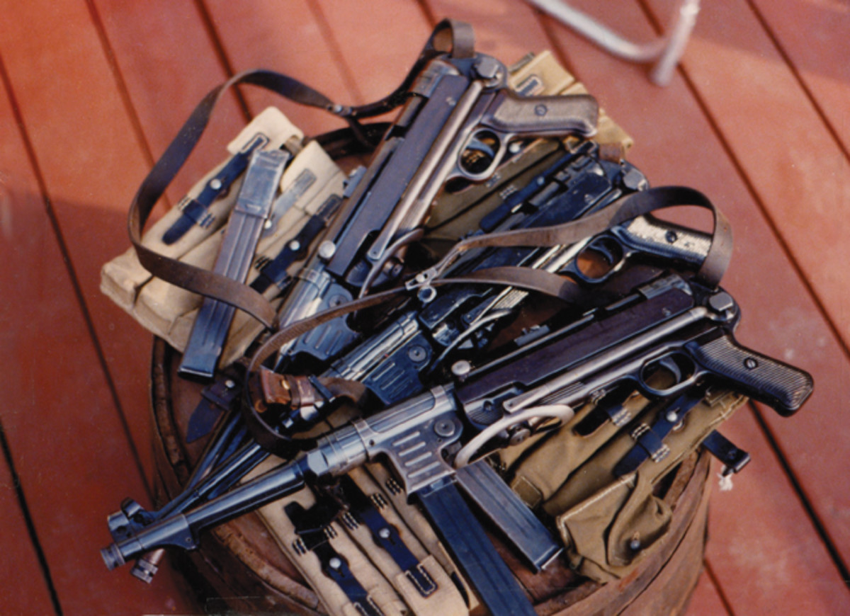 Stack of MP-38/40s and accessories.