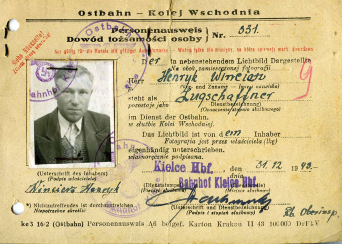 The obverse of the Ostbahn Personnenausweis identifies the holder, in this case, Henryk Wineiatz, a train conductor at the main train station in Kielce, a city in southeast Poland. 