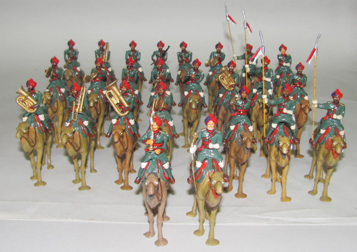 Walt Dineen 35-piece postwar Indian Camel Corps, $660. Old Toy Soldier Auctions image.