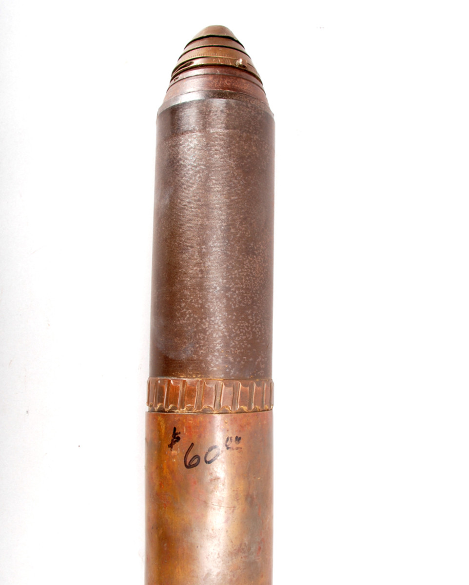 Magic marker price written on WWI artillery projectile.