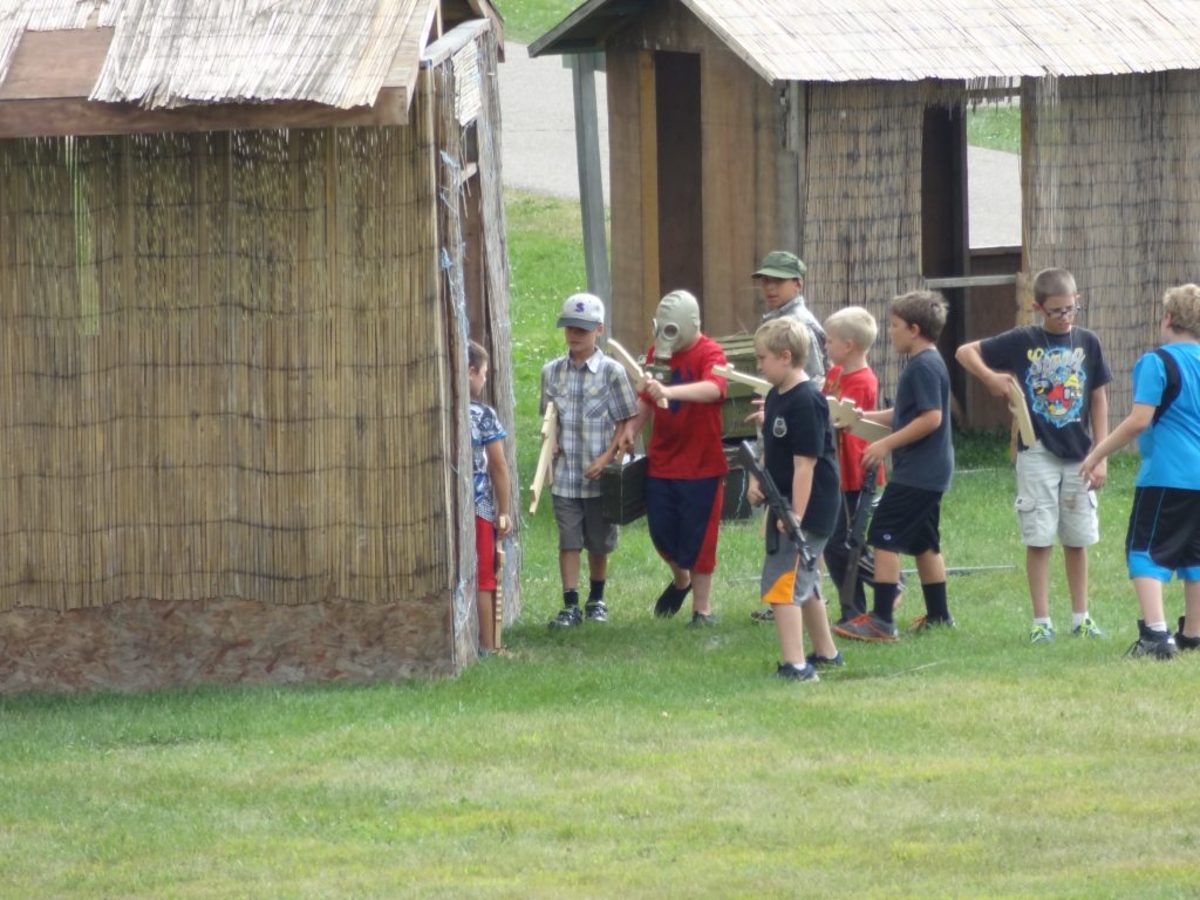 Discussions preceded "storming" a hooch during the 10 minute "wooden gun" battle. 