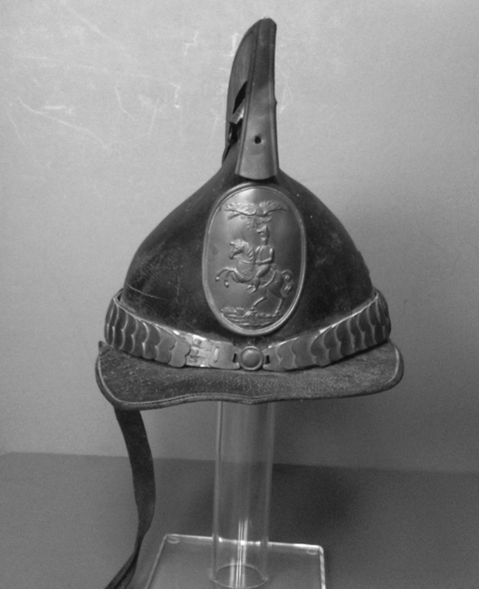  This New York militia dragoon helmet ca. 1840 was preserved with its original 1842 bill of sale made out to A.M. Davis by H.J. Storms of New York City, the well known military goods dealer and father of Civil War contractor C.S. Storms.