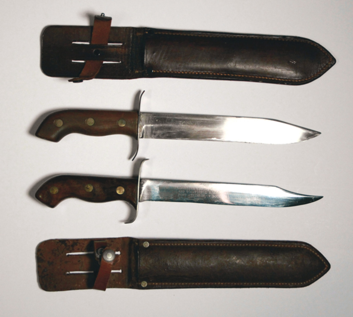The differences between the knives made at Fond du Lac and Fort Atkinson are most apparent when you compare the shape and finish of the blades.
