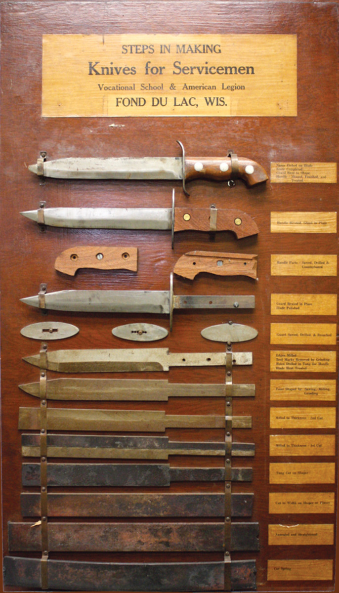 A full size display board illustrates the steps in making the vocational school knives from leaf spring steel to finished product. The blades went through the process of cutting, milling, grinding, shaping, heat treating and polishing before final assembly. The discoloration over the words “Fond du Lac” leads to speculation that this board may have been used in other locations with the new location affixed over the original wording.