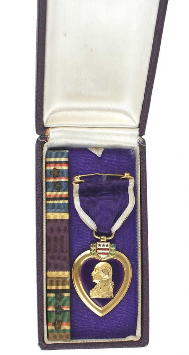 Navy-awarded Purple Heart for wounds received during D-Day, Normandy (Opening bid: $350).