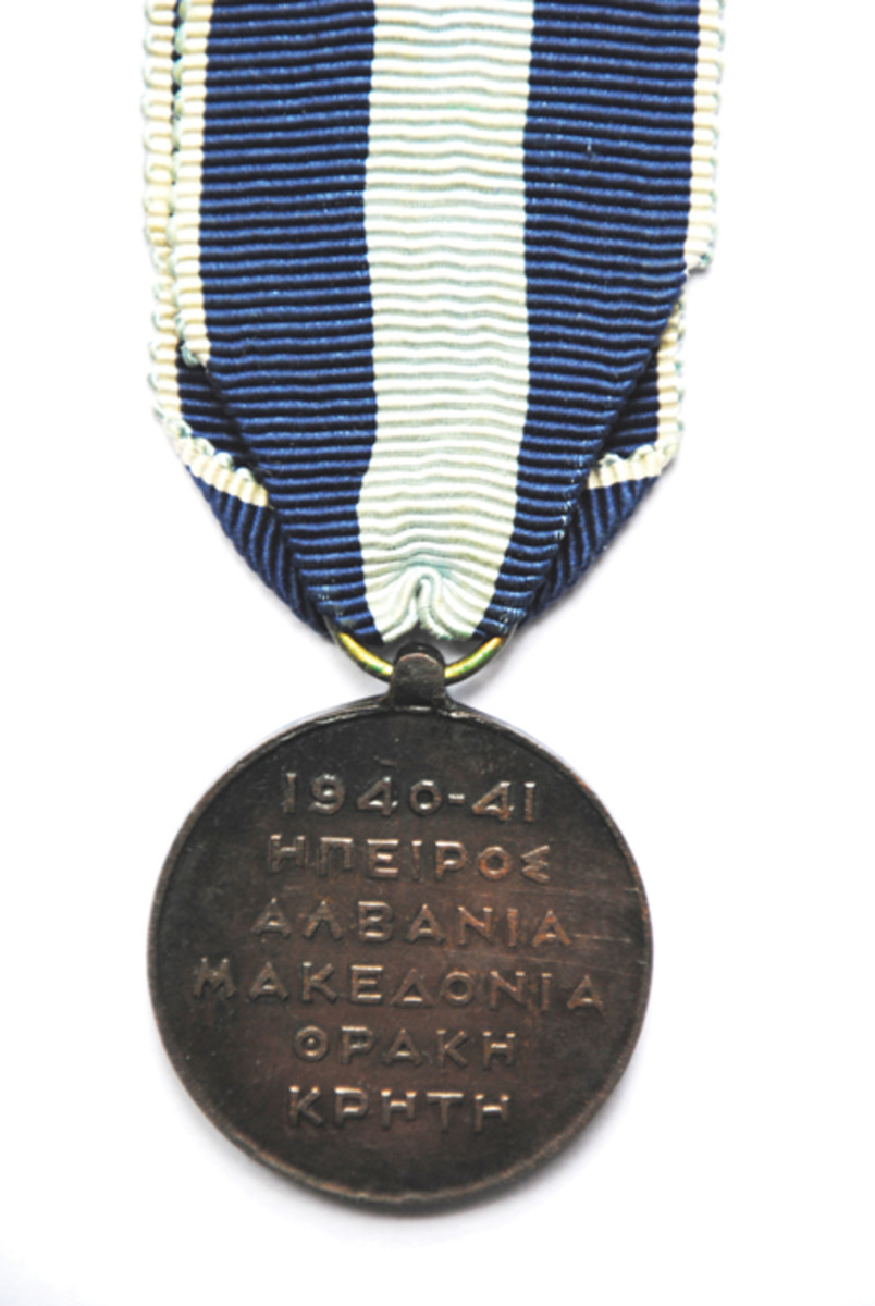 Greek War Medal, reverse. The list of locations where the fighting was fiercest listed on the reverse of the Greek War Medal 1940-41 showing the Cyrillic form of writing.