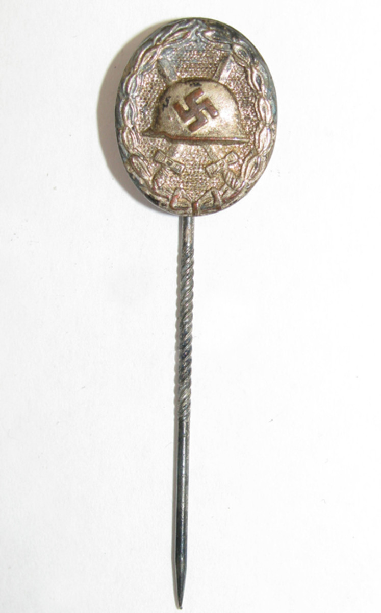Third Reich stick pin version of a gold wound badge.