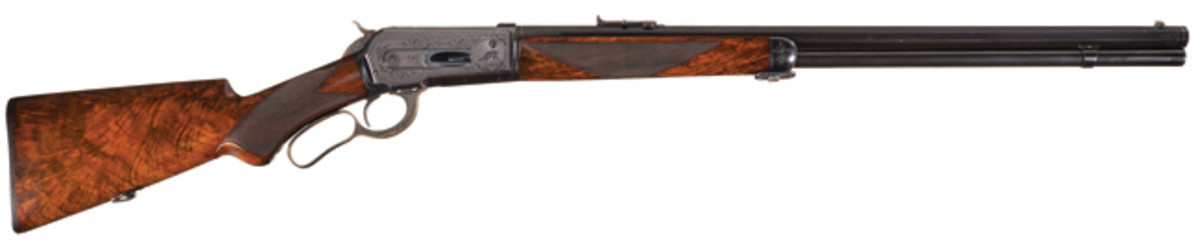 Rare Collectors Firearms Auctions
"> Factory Engraved Winchester Deluxe Model 1886 Lever Action Rifle with Platinum Barrel Bands and Factory Letter