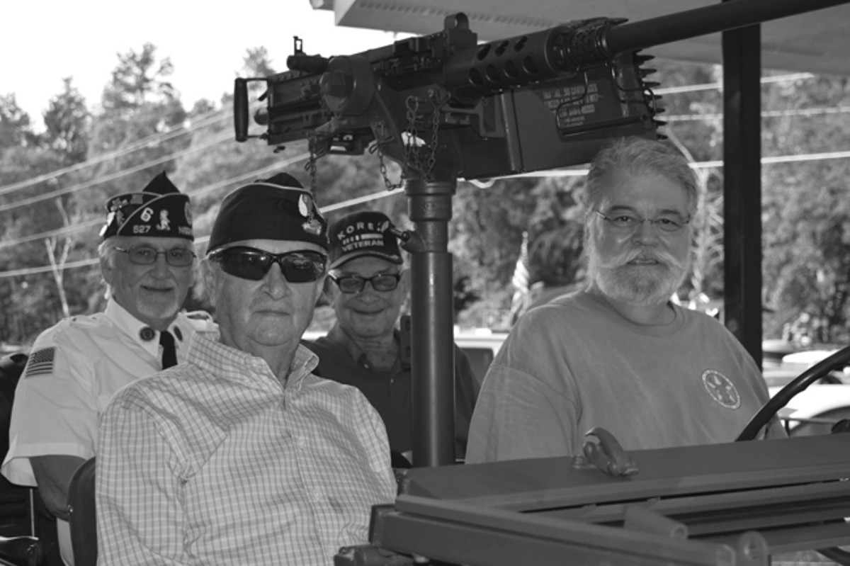  Nisswa, Minnesota, 2018 July 4th Parade. Korea War Vets Leroy Nordby and Bill Marshall with Vietnam Vet, Jim Starkey.