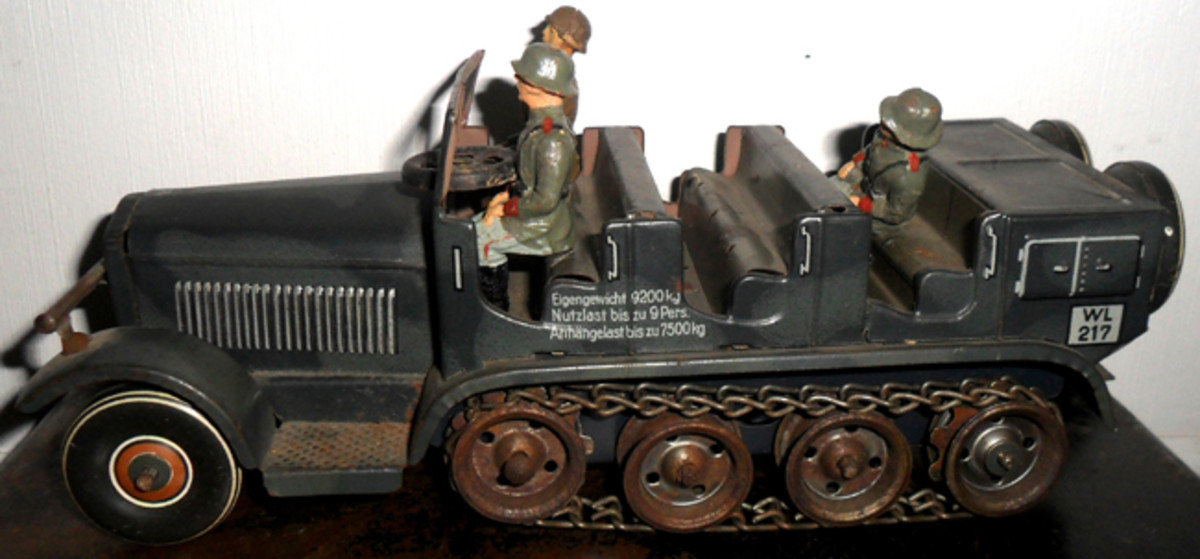 The Sonderkraftfahrzeug (Sd.Kfz.) or Special Purpose Vehicle was accurately modeled by both Hausser and Tippco. The Tippco version here is complete with Elastolin composition Wehrmacht troops.