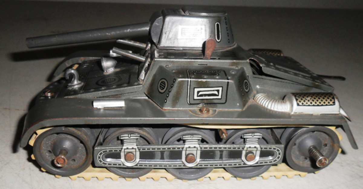 Wartime restrictions curbed German toy manufacturing. Today, it is difficult to find for collectors to find a wartime-produced tank with the single barrel cannon, (usually an 88mm). Shown here is a scarce Gescha 65-6.