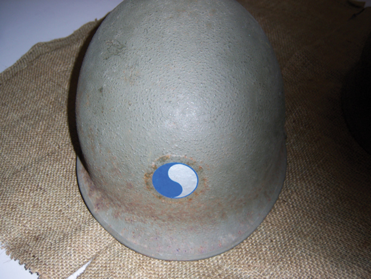 This helmet (#32) is typical of the McCord Style helmets with some surface rust. It is a front seam helmet with a manufacture date of March-April 1944.
