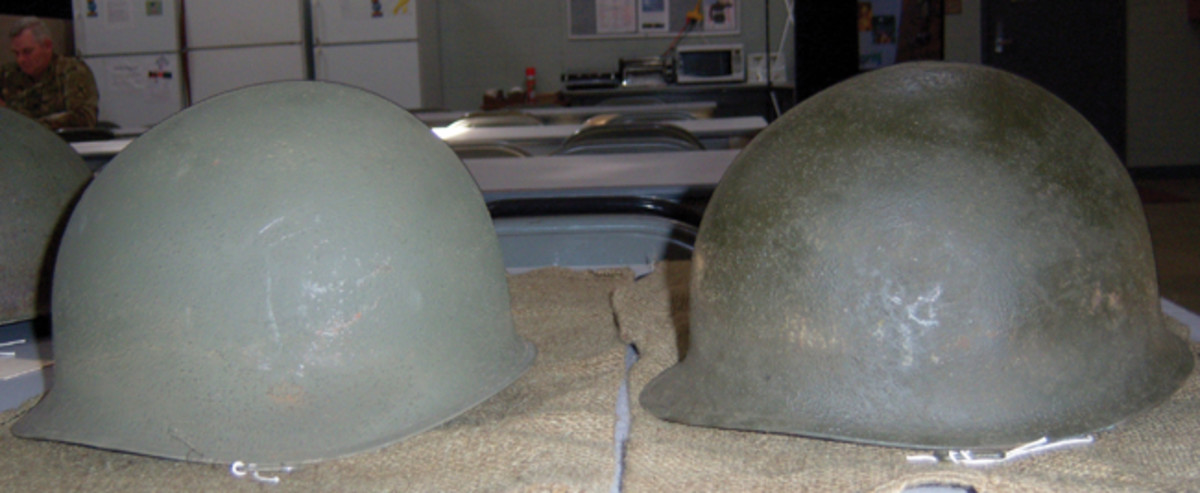 Of the 32 helmets recovered, 3 were made by Schlueter Manufacturing Company, the remaining 29 were McChords. For comparison, a McChord (#16) is shown on the left next to a Schleuter (#24). The differences in the width and angle of the brims are easily seen.