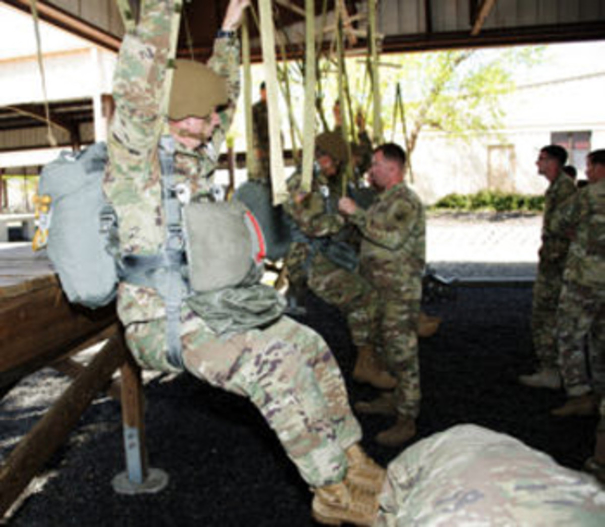  Soldiers participate in suspended harness training to ensure the new Integrated Head Protection System (IHPS) is suitable when performing canopy control and emergency procedures during operational testing. (Photo by Michael Zigmond, Audio Visual Production Specialist, Airborne and Special Operations Test Directorate, U.S. Army Operational Test Command)