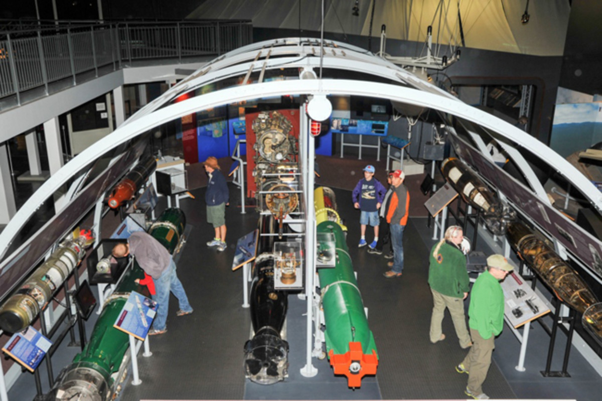  KEYPORT, Wash. – Guests observe exhibits at the Naval Undersea Museum Keyport Oct. 10, 2015 during Deep Submergence Rescue Vehicle (DSRV) Day. DSRV Day represents the one-year anniversary of the DSRV arriving at the Naval Museum. U.S. Navy photo by Mass Communication Specialist 3rd Class Charles D. Gaddis IV. (Released)