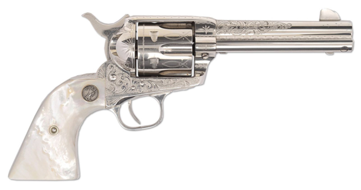 Minty factory engraved Colt SA by Cuno Helfricht. This exquisite example, in outstanding condition, was estimated at $30,000-50,000 and did very well at $57,500.