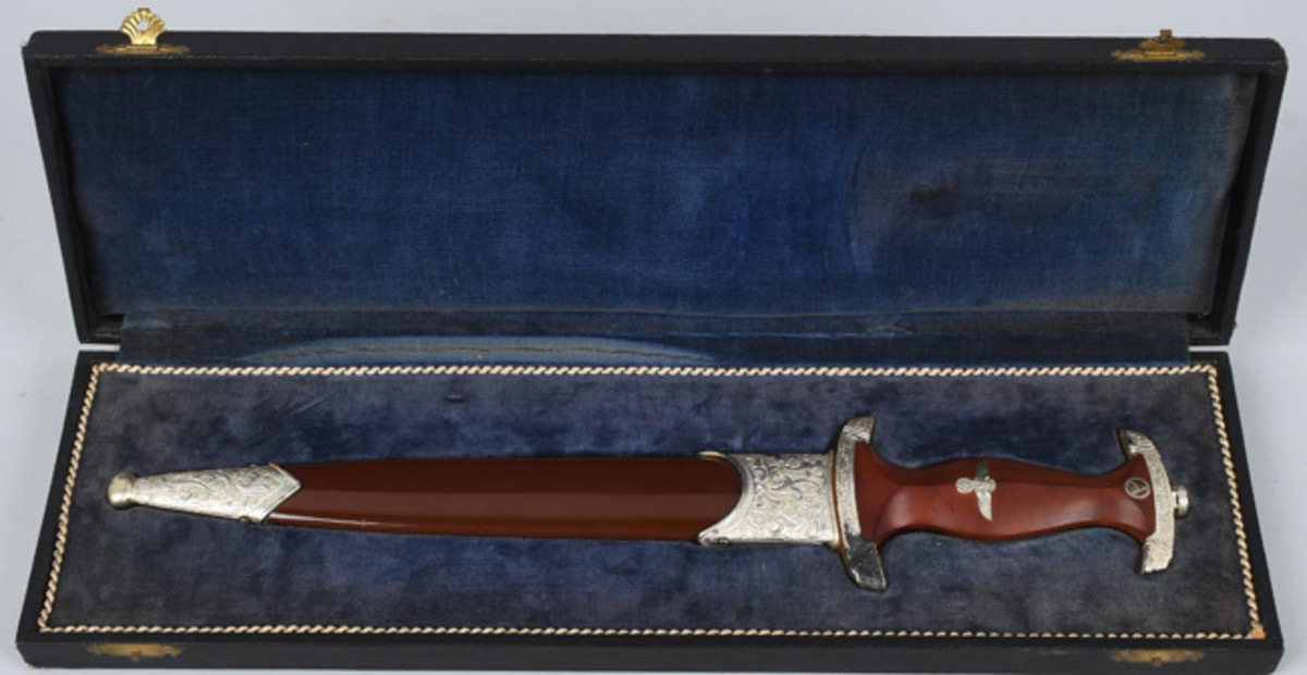  1939 German SA presentation dagger with a Damascus blade by E.F. Horster, engraved on verso in high-relief gold: “Alles fur Deutschland” (All for Germany), ornamental scabbard and fitted box. Estimate: $15,000-$20,000. Image - Milestone Auctions