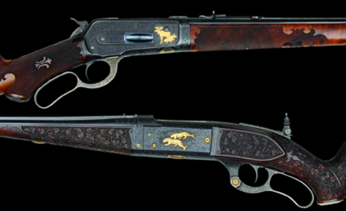 The famous John Dodge Winchester 86 and Savage 1899 (Wes Adams Collection) sold for $477,250.