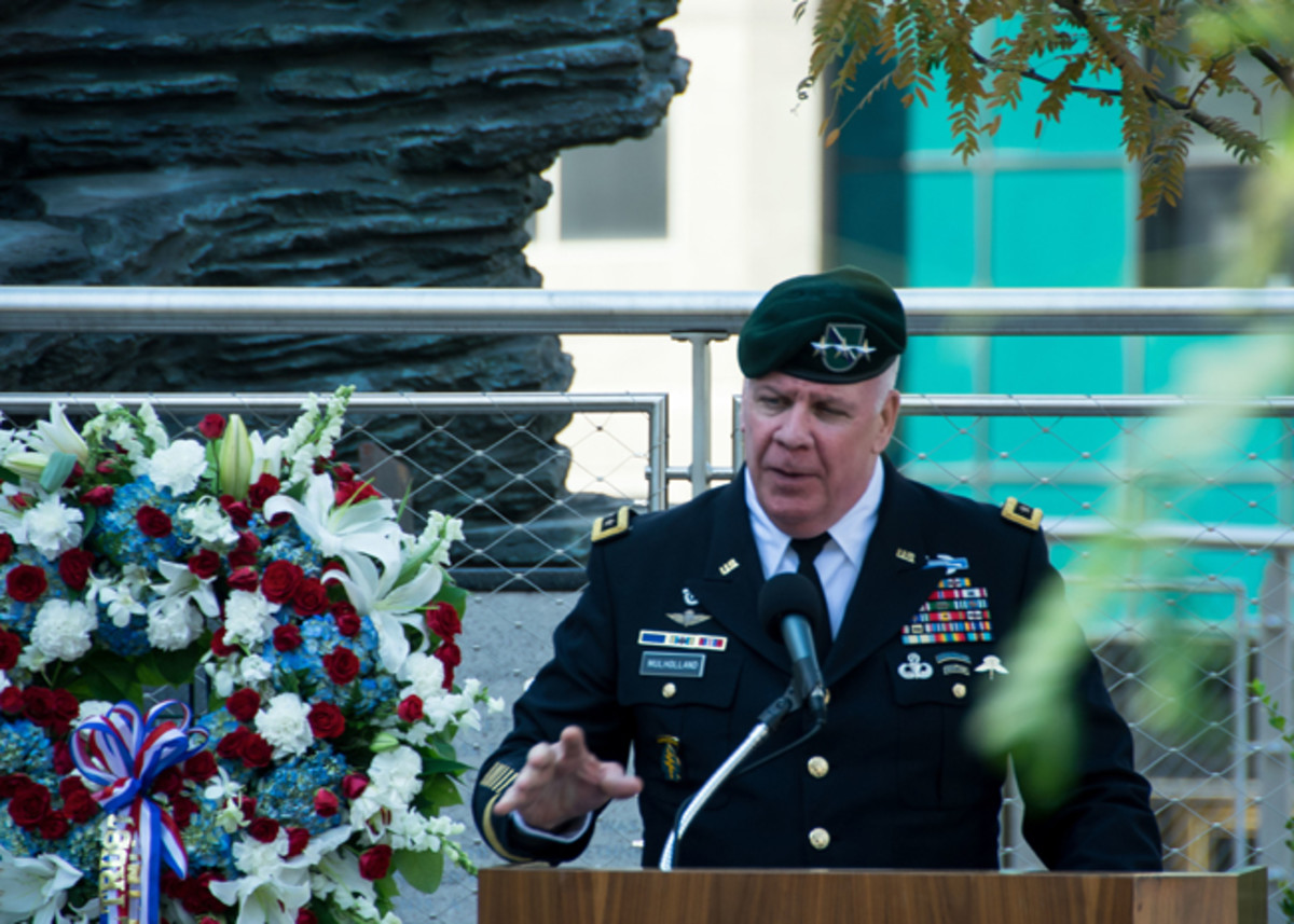 Lt. Gen. John F. Mulholland Jr., Associate Director for Military Affairs at the CIA, gives the keynote speech during the America’s Response statue rededication. Mulholland served as the Task Force Dagger commander in Afghanistan following the 9/11 attacks. (U.S. Army photo by Cheryle Rivas, USASOC Public Affairs.)