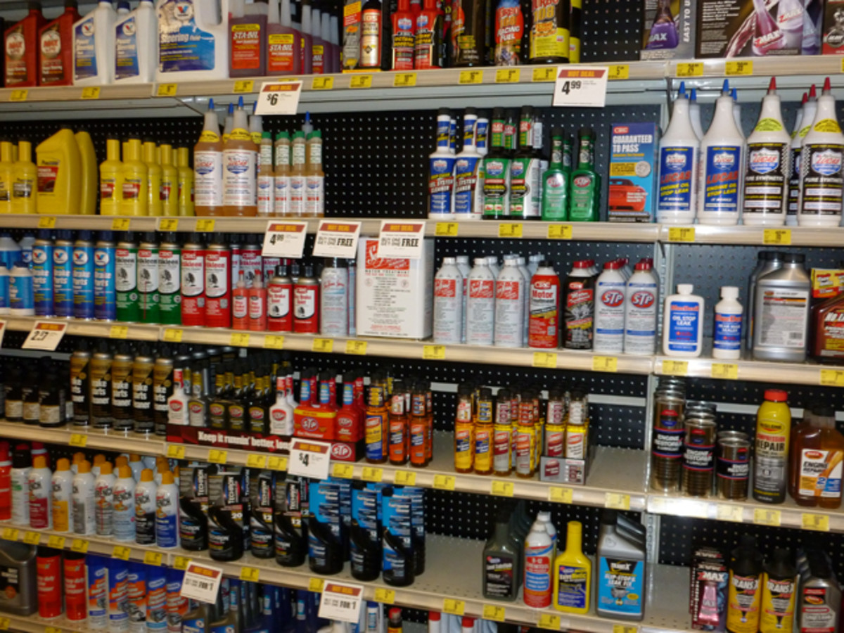 Shelves of “miracle” gas additives in a store.