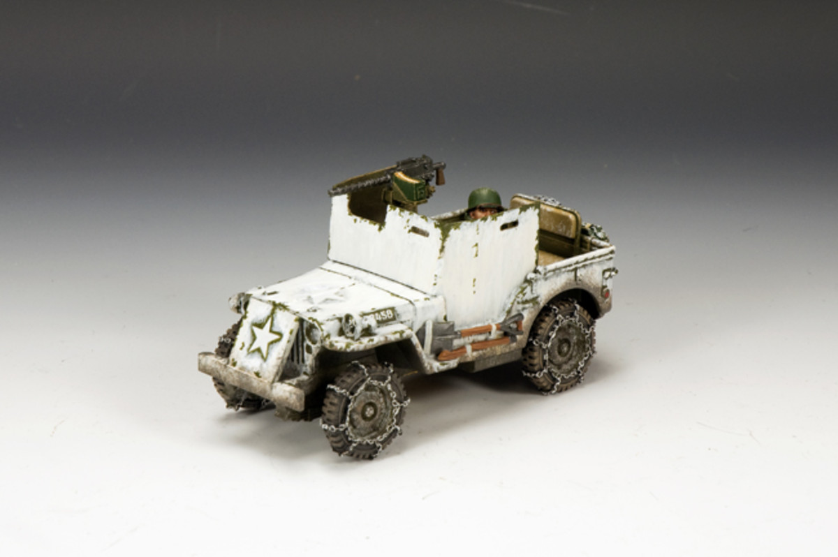 The famous armored Jeep carried armor plate protecting the front of the engine as well as three sides of the driver/ passenger area. A 30 cal. machine gun was mounted next to the driver. The vehicle has also been “snow” camouflaged with a rough coat of whitewash and snow chains added to the tires. This is available for $155. 