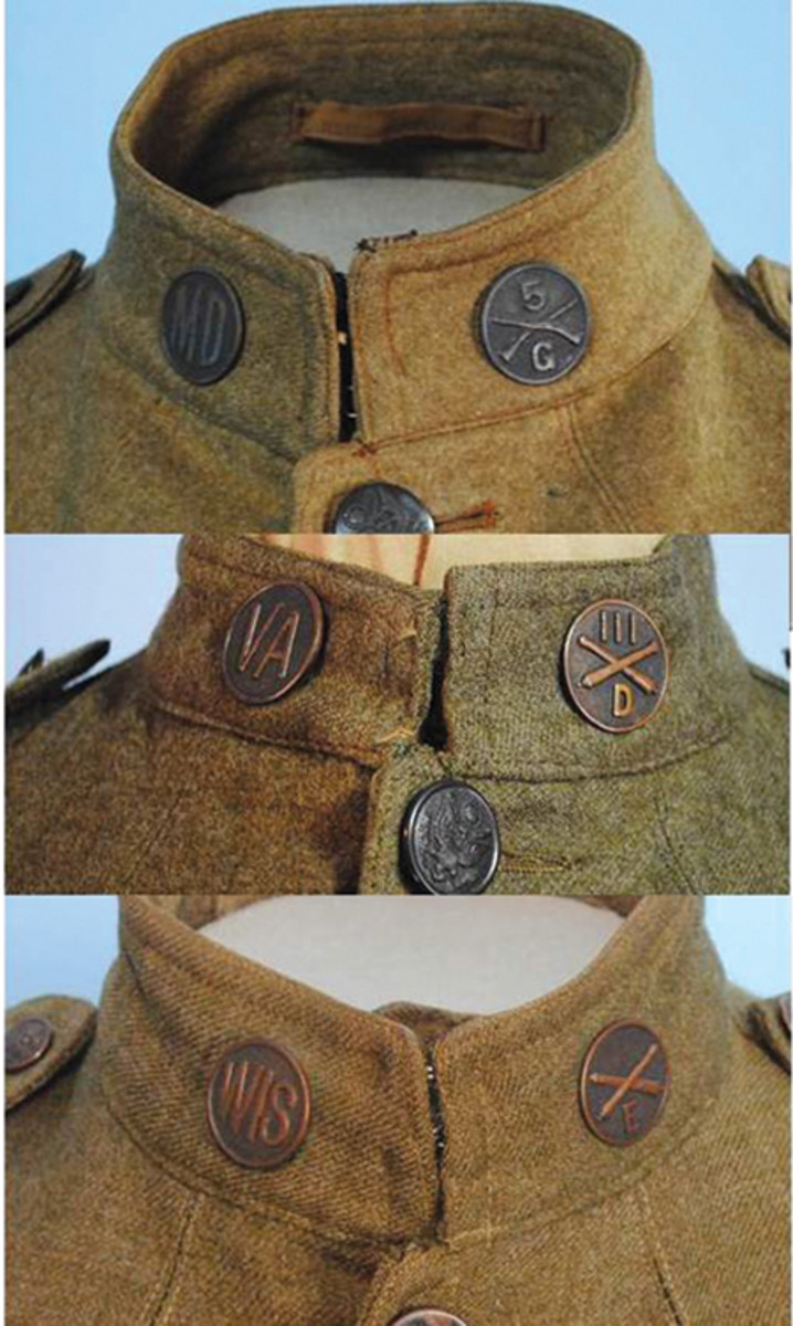  A mix of the new and the old. These three uniforms still reflect their owner’s state affiliation. The top example is wearing a collar disk from the 5th Maryland Infantry which was converted the 115th Infantry Regiment in the 29th Division. The other two examples keep their state disk but use the more updated unit/branch of service disk.