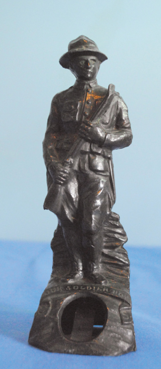  A heavy, but popular, souvenir to send home was the Doughboy statue with an opening created for a picture of “Our Soldier Boy.”